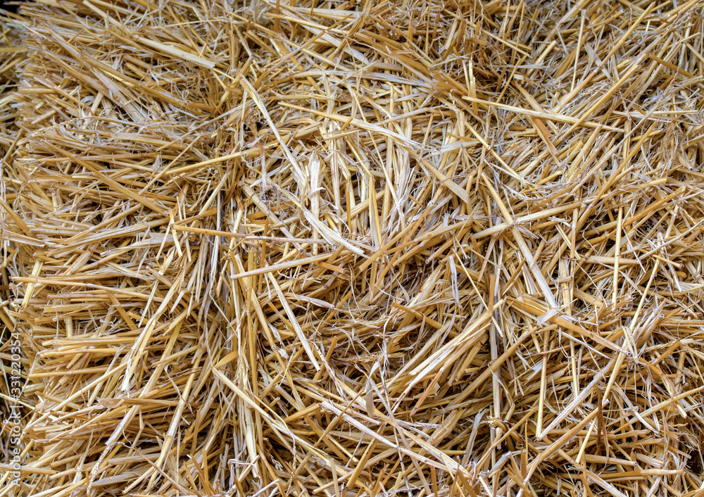 natural background of bales of yellow straw