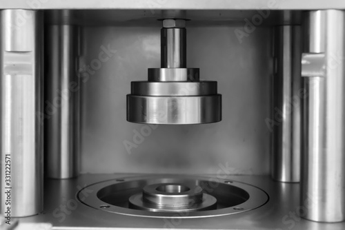Photos Close-up of the pressure equipment on the production line