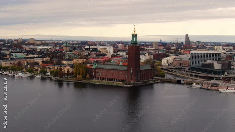 Drone push in shot showing Stockholm Sweden skyline during sunset Drone push in shot showing Stockholm Sweden skyline during sunset