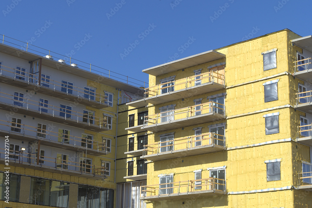 Fototapeta premium construction site residential building facade insulation