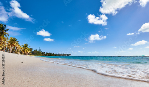 Tropical island. Desert island. Pure white sand. View of the beach from the water.