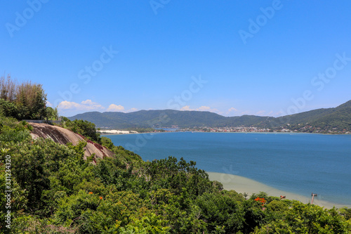 Fototapeta Naklejka Na Ścianę i Meble -  The beautiful panoramic view from the Mole beach viewpoint in Florianópolis, Santa Catarina.