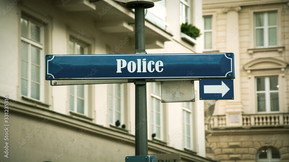 Street Sign to Police