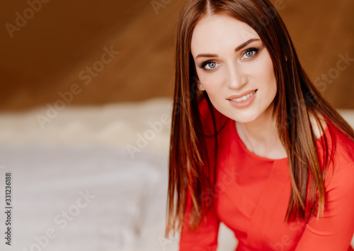 close-up portrait beautiful girl long hair in red