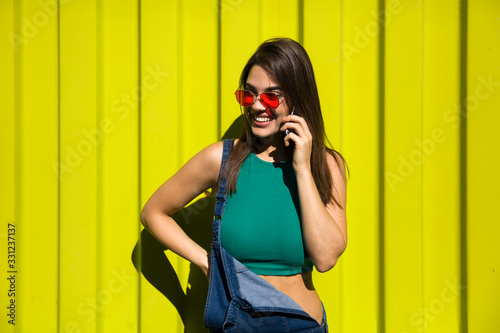 Young woman using mobile ph...