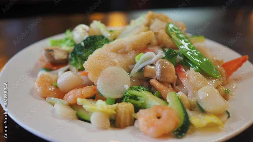 Close up shot of a plate of fried seafood and vegatable Close up shot of a plate of fried seafood and vegatable