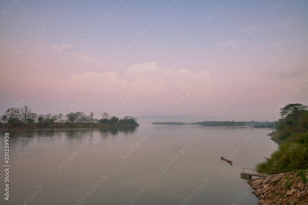 morning skyline and fog in khong river from chiang san of chiang rai thailand