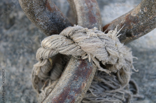 A close up of a ropeundefined in the harbour of tuscany