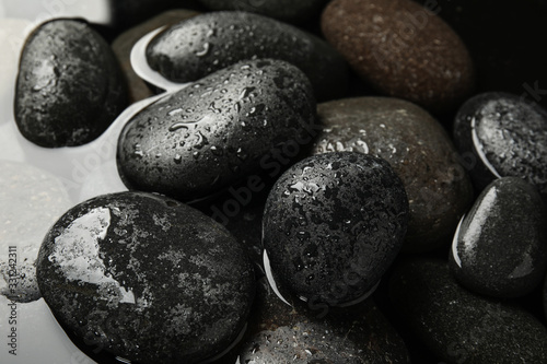 Pile of stones in water as background  closeup. Zen lifestyle