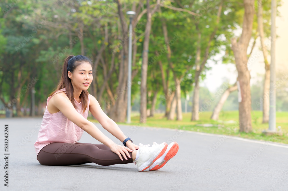 Beautiful Asian women exercise in the park every morning, It is a lifestyle for relaxation and good health of the body Beautiful Asian women exercise in the park every morning, It is a lifestyle for relaxation and good health of the body
