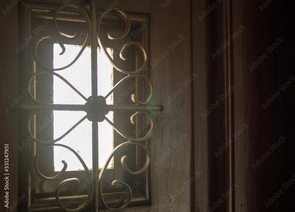 Little window on a main entrance door for safety issues Little window on a main entrance door for safety issues