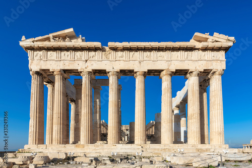 Parthenon temple at morning time with blue sky in Acropolis, Athens, Greece.  photo