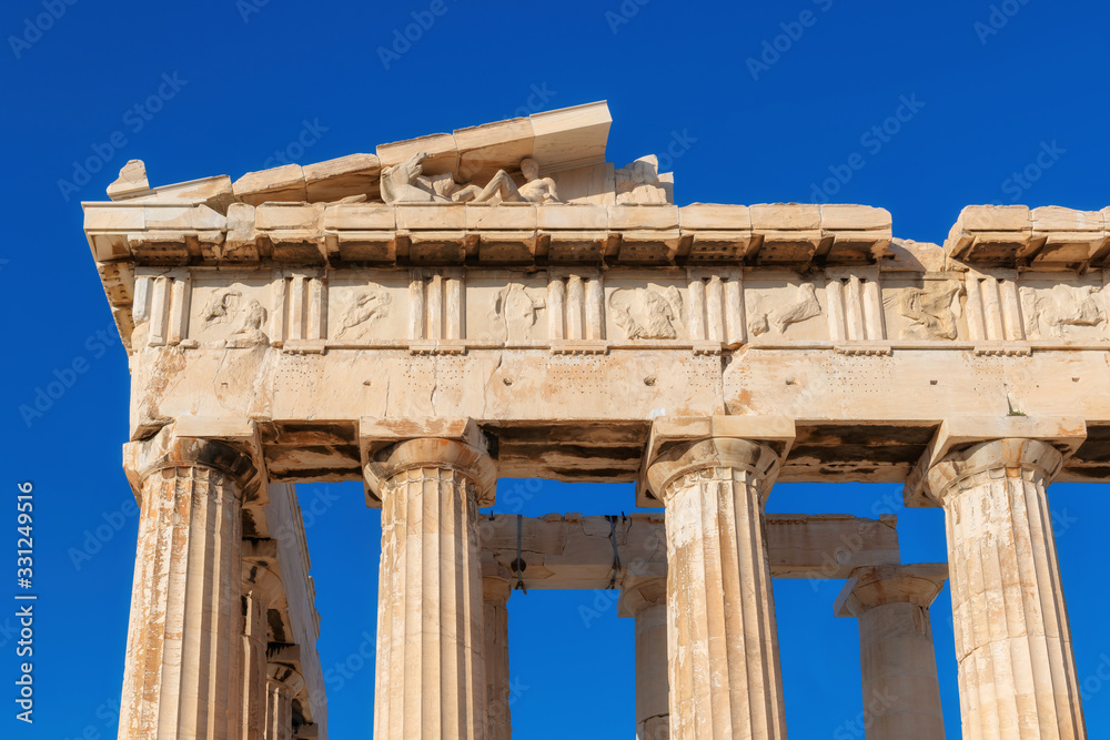 Parthenon temple at morning time with blue sky in Acropolis, Athens, Greece. 