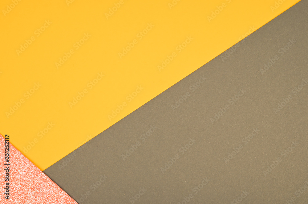 Color paper composition. Top view background, minimal concept, flat lay: taupe, goldenrod and pink glitter Color paper composition. Top view background, minimal concept, flat lay: taupe, goldenrod and pink glitter