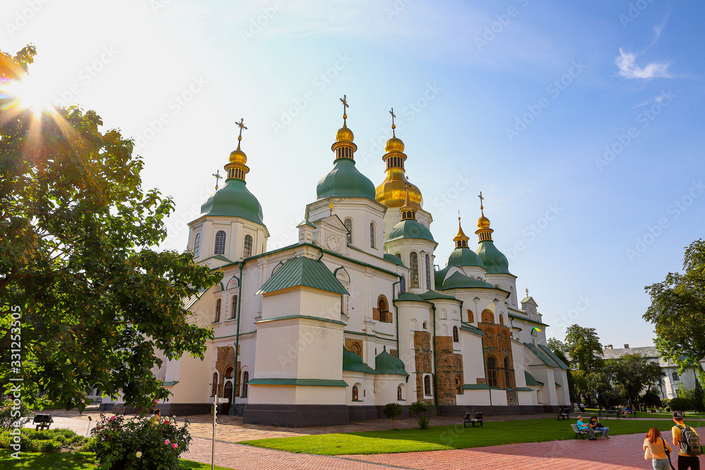 View of the Cathedral, Sofia Kyiv is a landmark of history and architecture. sunny day . Gold domes, orthodox crosses. UNESCO World Heritage Site St. Sophia Cathedral in Kyiv, the capital of Ukraine. View of the Cathedral, Sofia Kyiv is a landmark of history and architecture. sunny day . Gold domes, orthodox crosses. UNESCO World Heritage Site St. Sophia Cathedral in Kyiv, the capital of Ukraine.