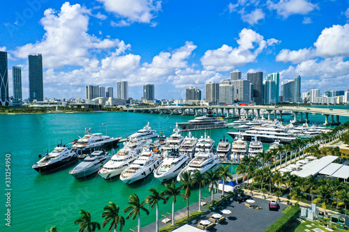 Aerial Photography of Luxury Boats and Buildings in the Background photo