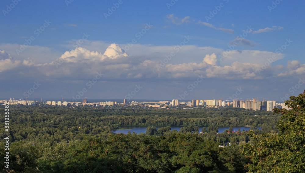 Lake in the forest near a large metropolis