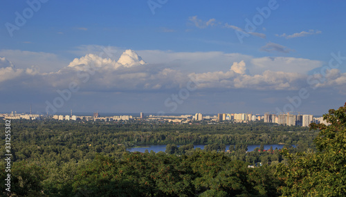 Lake in the forest near a large metropolis
