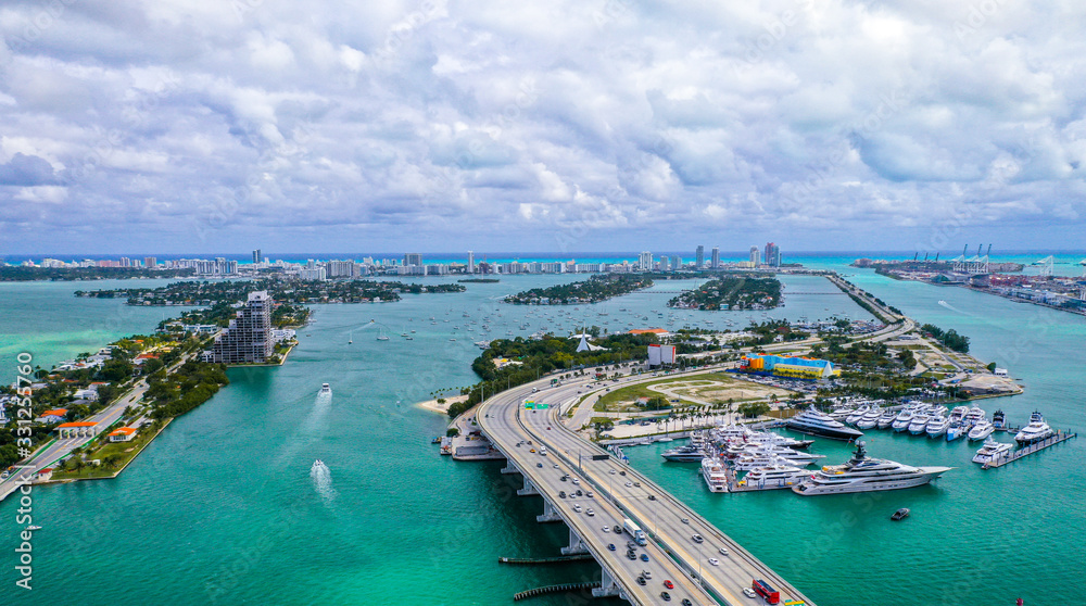 Aerial Photography of Luxury Boats and Miami Beach in the Background