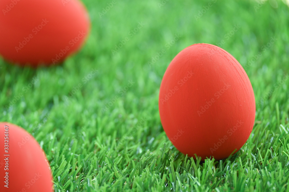 red easter egg on lawn green grass artificial, image of morning springtime concept red easter egg on lawn green grass artificial, image of morning springtime concept