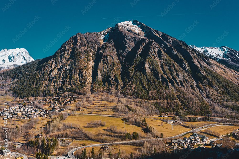 The village Palleusieux under a big mountain, in the Basin Pre-Saint-Didier, Aosta Valley at the time of corona virus outbreak, northern Italy