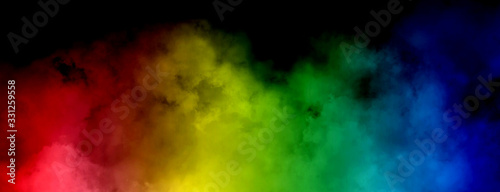 Abstract image of Colorful smoke or fog in black background. © Angkana