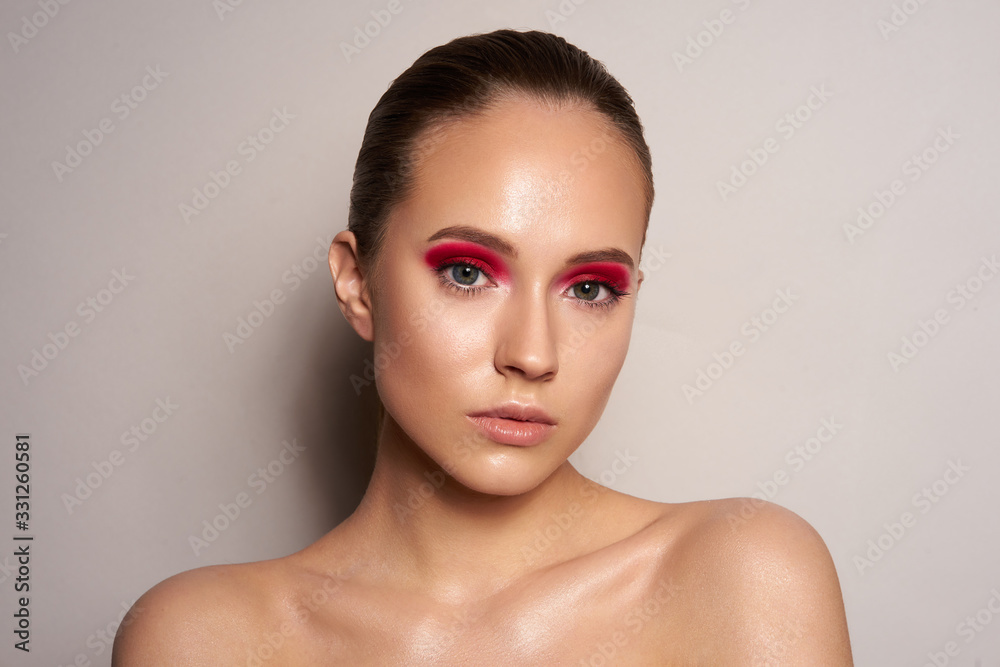 Young girl with pink shadow eyes and clean skin Young girl with pink shadow eyes and clean skin