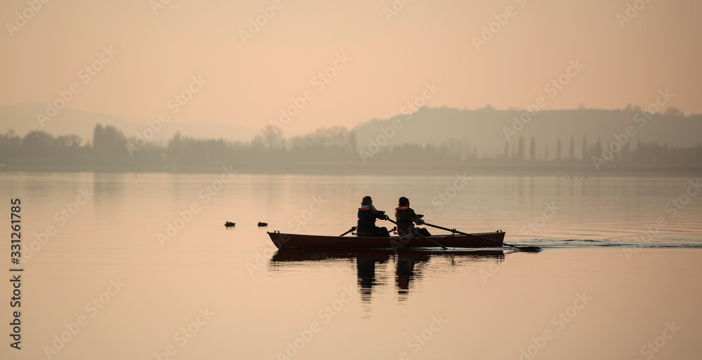 Boating in the dawn on the Lake Constance (Bodensee); Germany