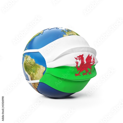 Earth Globe in a medical mask with flag of Wales  isolated on white background. Global epidemic of Chinese coronavirus concept.