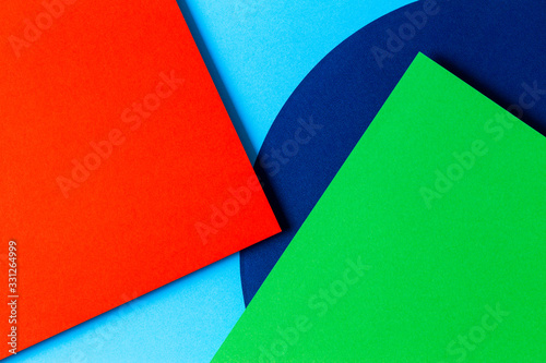 Abstract colored paper texture background. Minimal geometric shapes and lines in red, light blue, navy, green colors