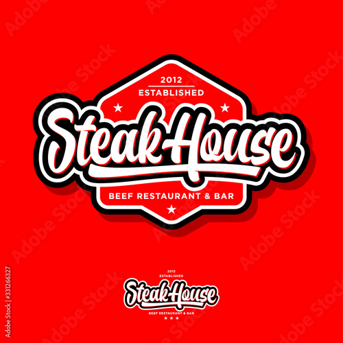 Steak house logo. Butchery or restaurant logo. Calligraphic composition with stars. Vintage American style.