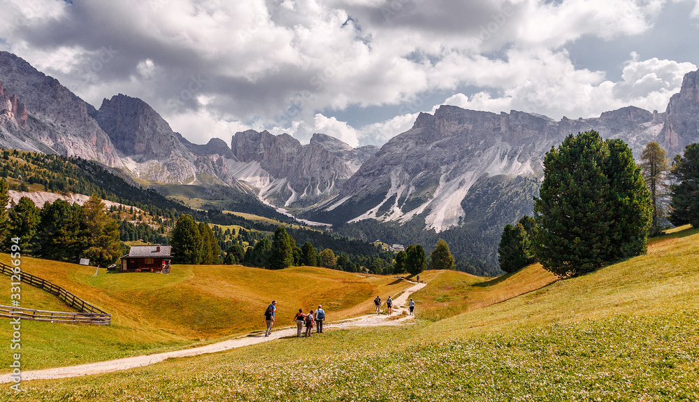Beautiful alpine highlands in sunny day. Awesome nature Landscape. Amazing Nature Scenery of Dolomites Alps. Epic Scene in the mountains place. Val Gardena. Dolomiti alp. Italy. Travel concept