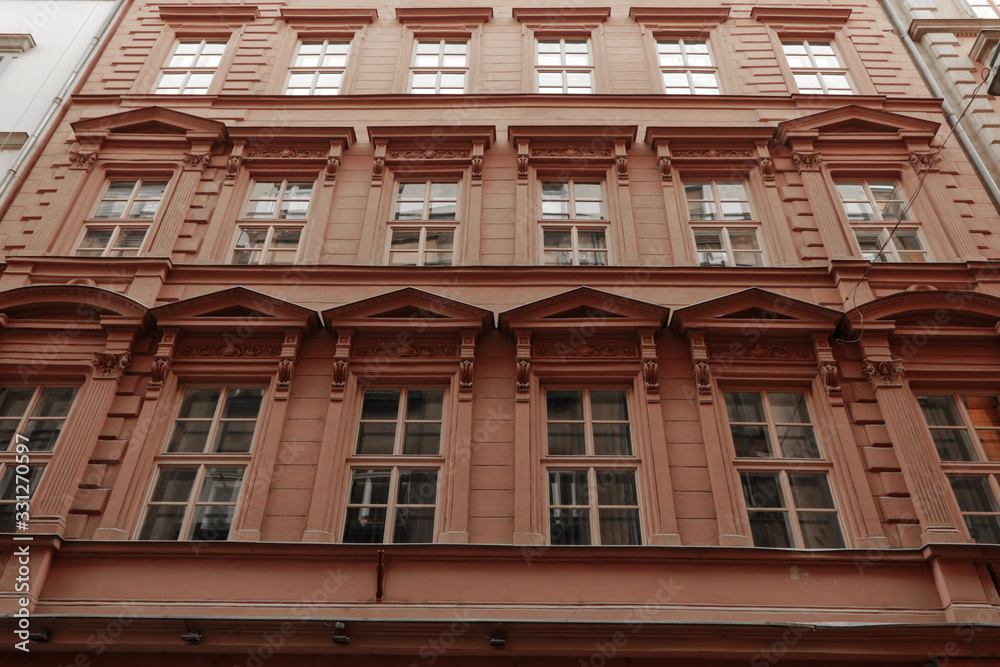 A pink facade of a neo renaissance style building A pink facade of a neo renaissance style building