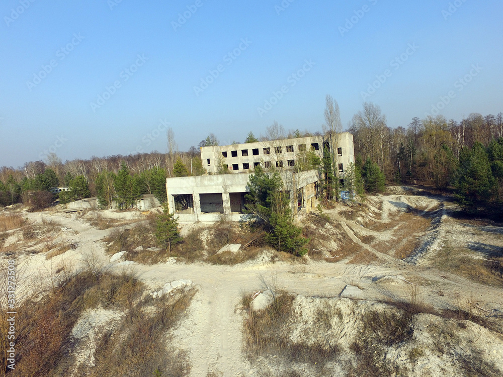 Drone quadrocopter explores an abandoned industrial complex.Kiev Region