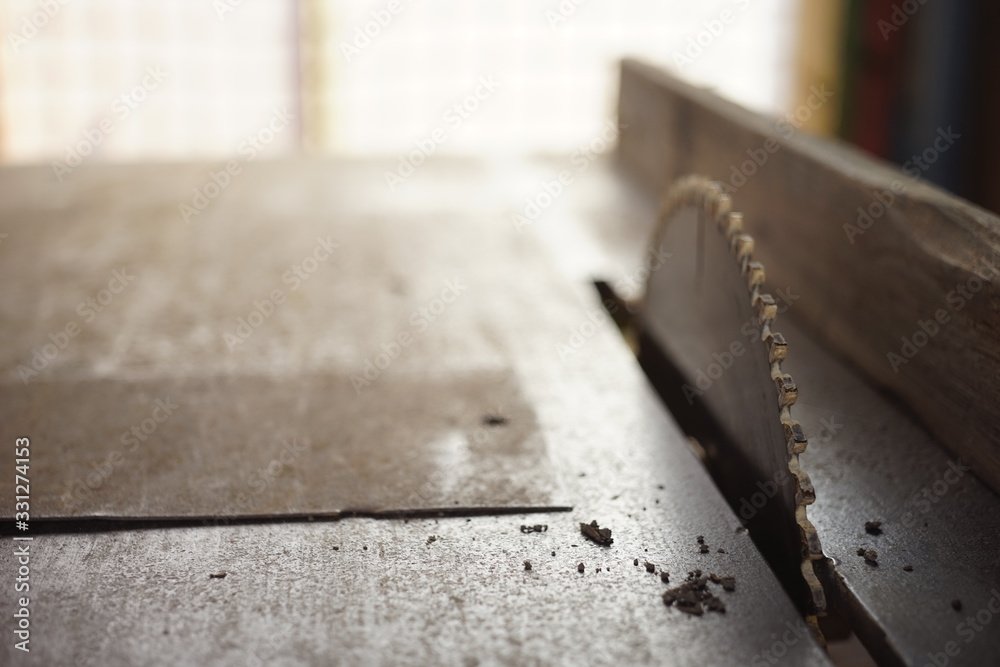 Closeup metal dish electric saw in iron table. Closeup metal dish electric saw in iron table.