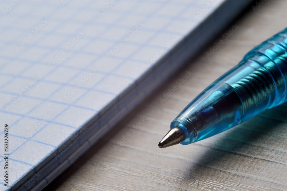 ballpoint pen on open spiral notebook, macro ballpoint pen on open spiral notebook, macro