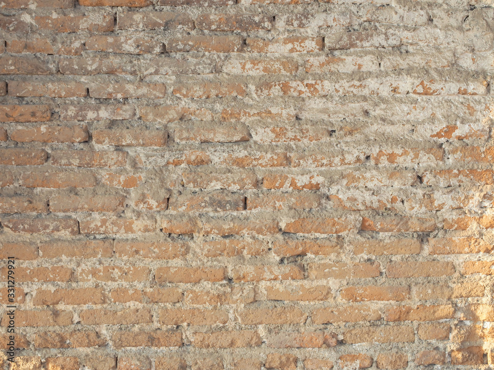 Fototapeta premium Texture of old brick wall with scratches,cracks and stains as a retro pattern wall.Concept is conceptual or wall banner,decorate,abstract background,material,construction