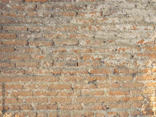 Texture of old brick wall with scratches,cracks and stains as a retro pattern wall.Concept is conceptual or wall banner,decorate,abstract background,material,construction