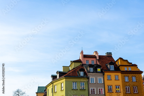 Warsaw, Poland - 18/ 03/ 2020:. Beautiful multi-colored houses in the old town in Warsaw. The central streets of the historic center of Warsaw. The main tourist attraction of Warsaw.  © Vitalii