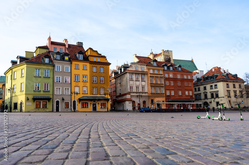 Warsaw, Poland - 18/ 03/ 2020:. Beautiful multi-colored houses in the old town in Warsaw. The central streets of the historic center of Warsaw. The main tourist attraction of Warsaw. 