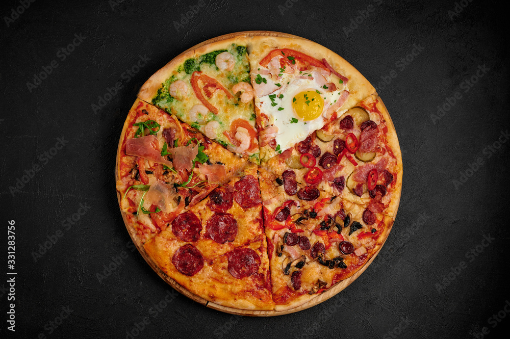 pizza on a black background, assorted in one pizza, assorted pizza
