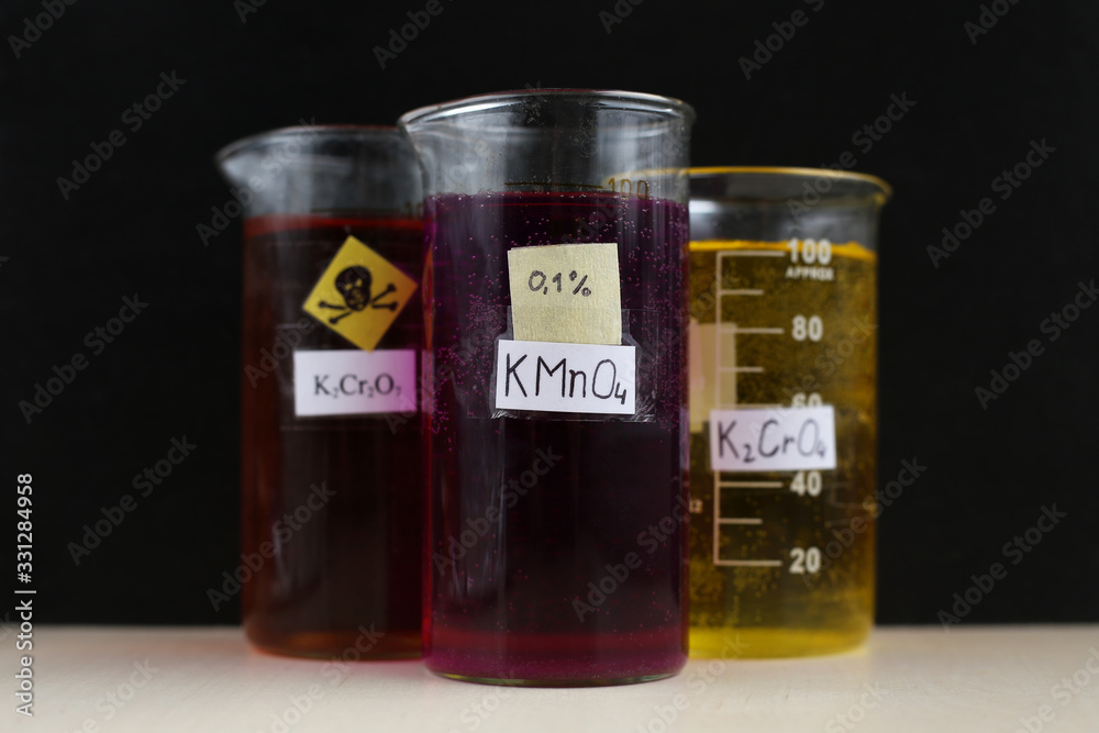 A beaker with a purple aqueous solution of potassium permanganate with concentration of 0.1 percent, a solution of this substance can be used as an antiseptic. A beaker with a purple aqueous solution of potassium permanganate with concentration of 0.1 percent, a solution of this substance can be used as an antiseptic.