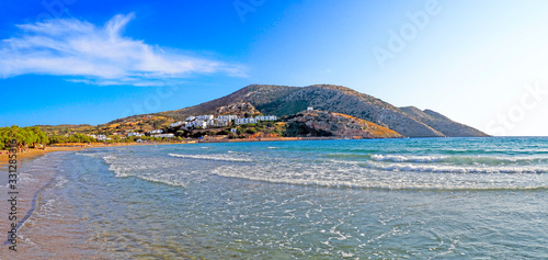 superb panoramic view of the sandy beach of Galissas, on Syros, famous Cyclades island, in the heart of the Aegean Sea photo