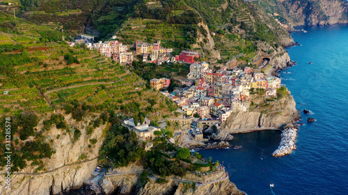 Village of Manarola in aerial view  Cinque Terre coast of Italy. Manarola is a small town in the province of La Spezia  in Liguria  in northern Italy and one of the Cinque Terre attractions for touris