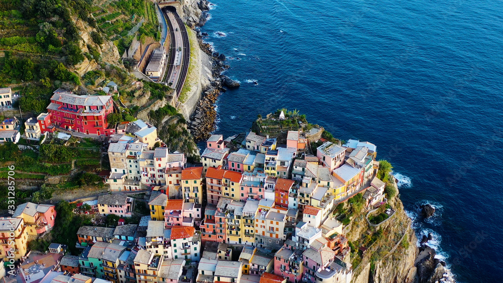 Village of Manarola in aerial view, Cinque Terre coast of Italy. Manarola is a small town in the province of La Spezia, in Liguria, in the north of Italy, magnificent seen from the Italian coast