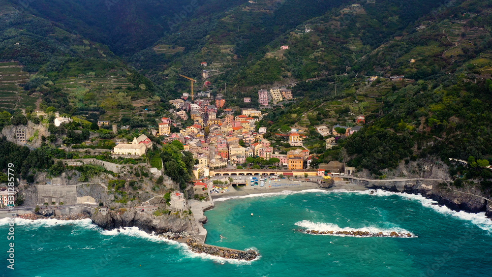 Monterosso is a village in the province of La Spezia, which is part of the Liguria region (northern Italy). It is one of the five Cinque Terre villages. aerial view with a drone and travel concept	