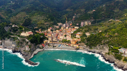 Fototapeta Naklejka Na Ścianę i Meble -  Monterosso is a village in the province of La Spezia, which is part of the Liguria region (northern Italy). It is one of the five Cinque Terre villages. aerial view with a drone and travel concept	