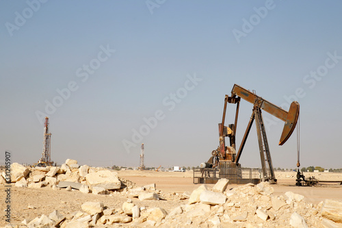 Obraz na płótnie Oil pump jack in desert, Oman