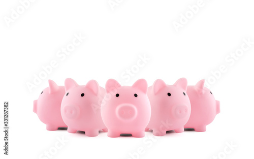 Group of pink piggy banks on white background