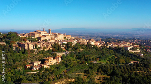 Authentic village of Montepulciano. A beautiful old town with red roofs in Tuscany, Italy. Perfect for travels and vacations - aerial view with a drone 